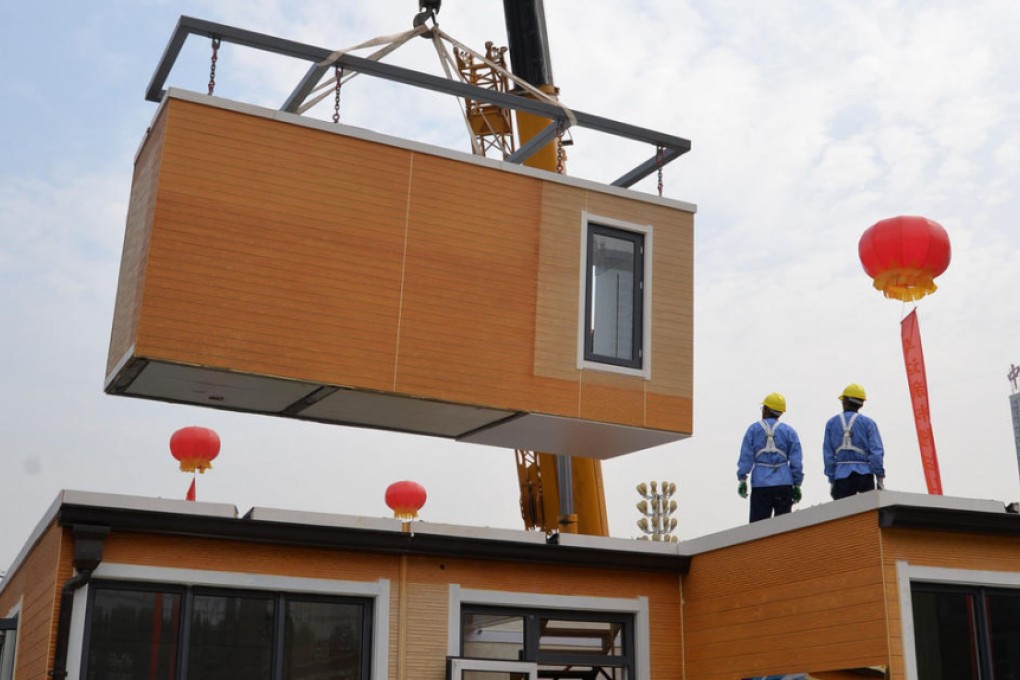 A villa being assembled at a green modular housing show. Photo: ImagineChina
