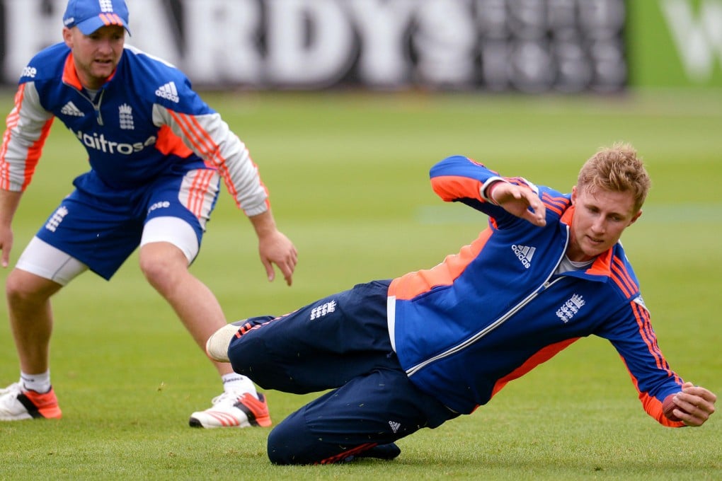 Joe Root takes a catch in training. Photo: Reuters