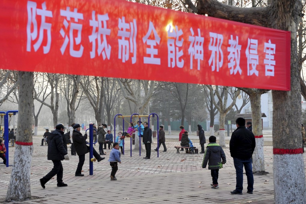 A banner in Puyang, Henan province, warns against cult influence. Photo: Reuters