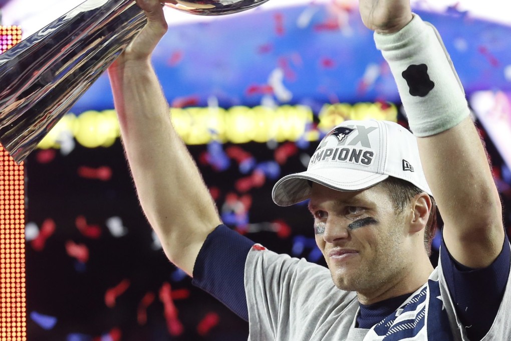 Tom Brady with the Super Bowl trophy. Photo: EPA