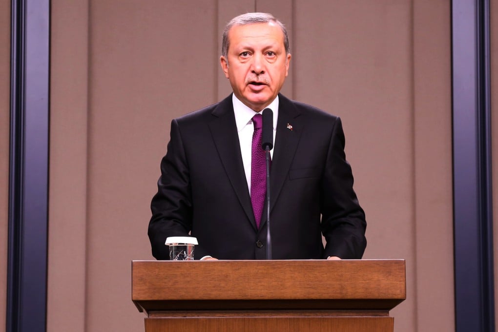 Turkish President Recep Tayyip Erdogan speaks during a press conference before departing for Beijing in Ankara Esenboga Airport, Turkey. Photo: Xinhua