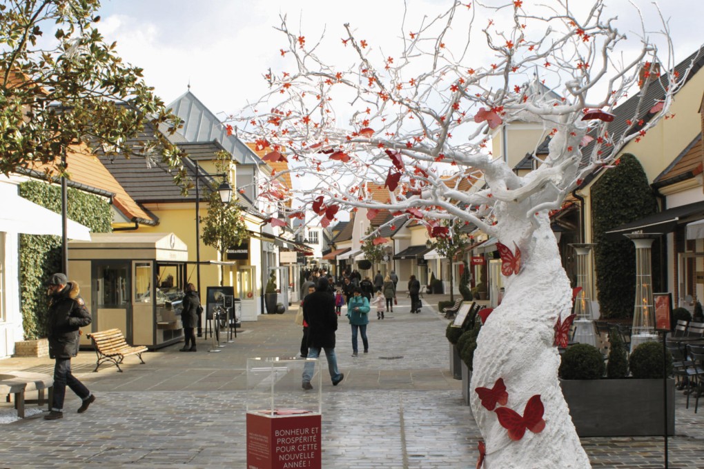 A Lunar New Year wishing tree at designer outlet Bicester Village. Photo: Etan Smallman