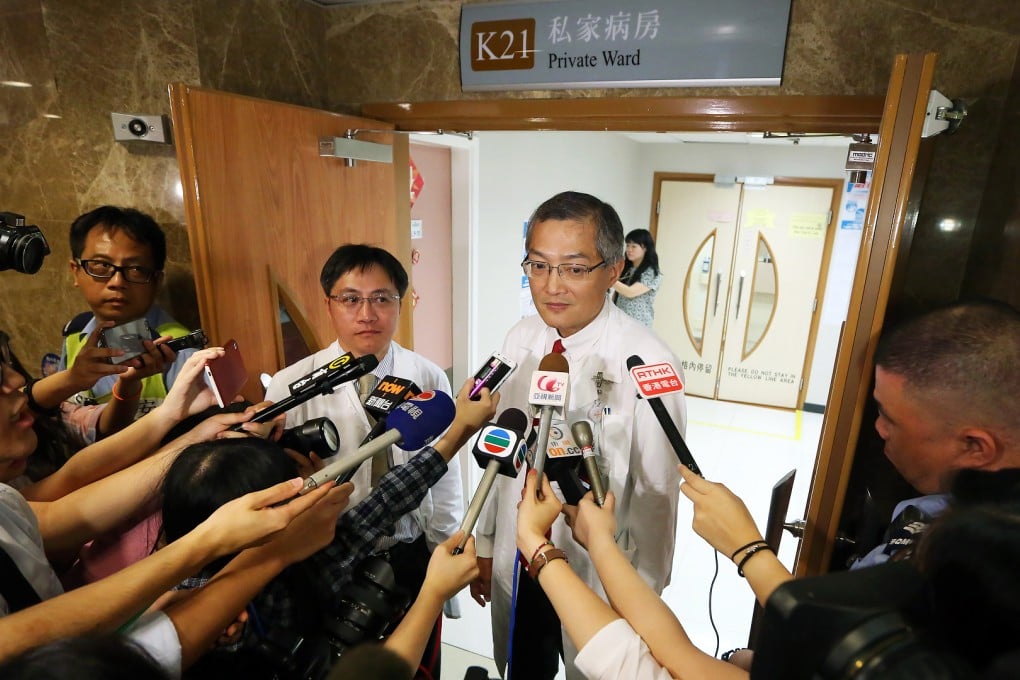 HKU council member Professor Lo Chung-mau, who fell down during a chaotic Hong Kong University council meeting, meet the press at the Queen Mary Hospital in Pok Fu Lam. Photo: Sam Tsang