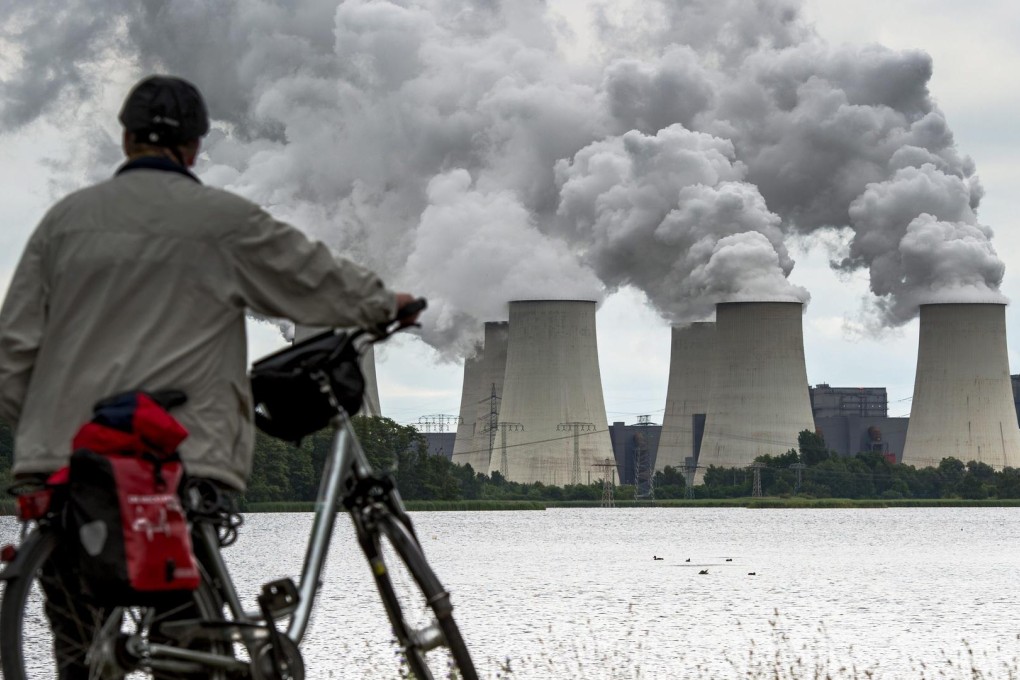 The cooling towers of a brown coal power station in Germany. The transition to a post-coal future won't be easy, says Richard Martin. Photo: EPA