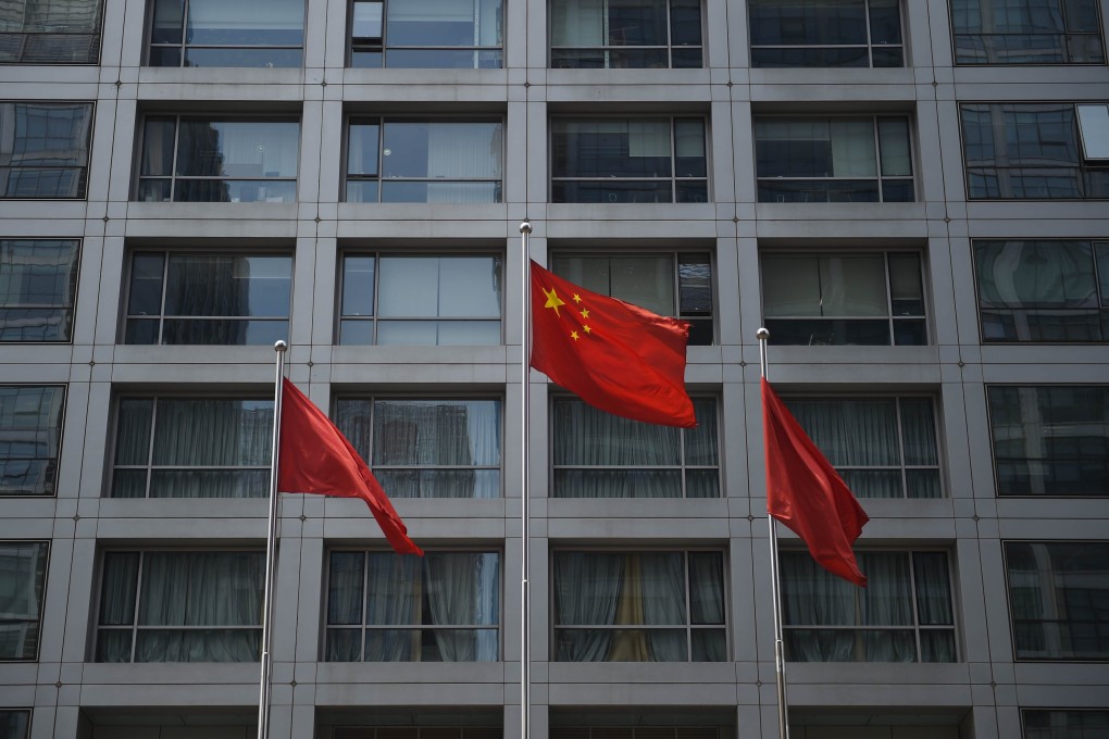The Chinese flag flies outside the offices of the China Securities Regulatory Commission in Beijing. Photo: AFP