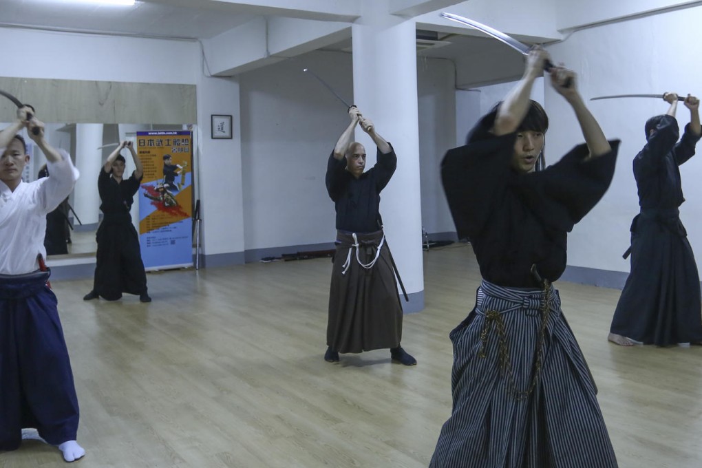 Members of the Hong Kong Toyama-Ryu Iaido Association train using live blades during sessions known as kata. Photos: Jonathan Wong
