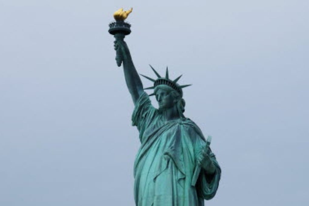 "Give me your tired, your poor, Your huddled masses yearning to breathe free " begins the inscription at the Statue of Liberty. Photo: AFP
