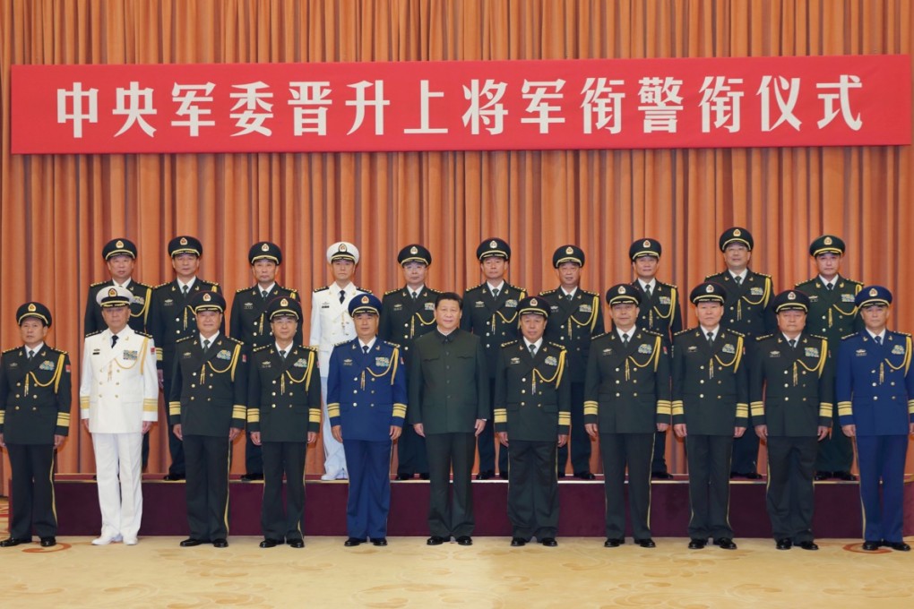 Chinese President Xi Jinping with the ten newly promoted generals at Friday's ceremony, a day after the announcement of former army chief Gen. Guo Boxiong to face prosecution for graft allegation. Photo: Xinhua