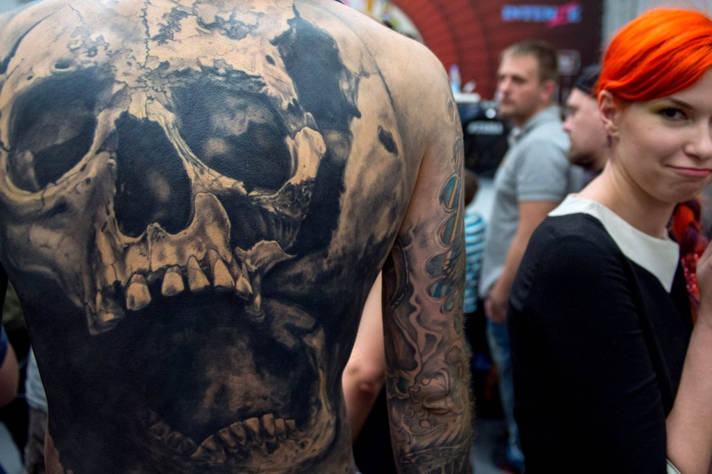 Some of the ink on offer at Moscow International Tattoo Week late last month. Photo: AFP