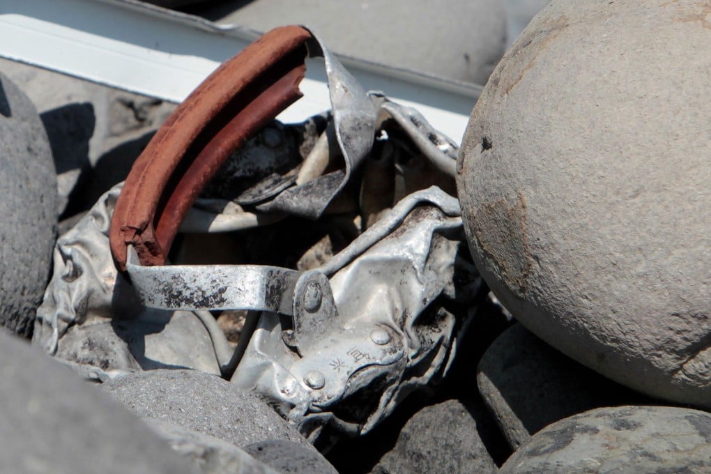 New metallic debris was found on a beach on the French Reunion Island close to where where a Boeing 777 wing part believed to belong to missing flight MH370 washed up last week. Photo: AFP