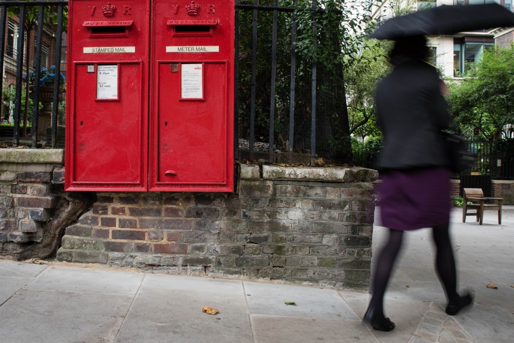 Late Victorian wall-mounted post boxes are still in use by the Royal Mail. Photo: AFP
