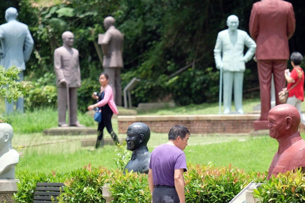 Visitors view statues of Taiwan's late nationalist leader Chiang Kai-shek at a park in northern Taoyuan. Photo: AFP