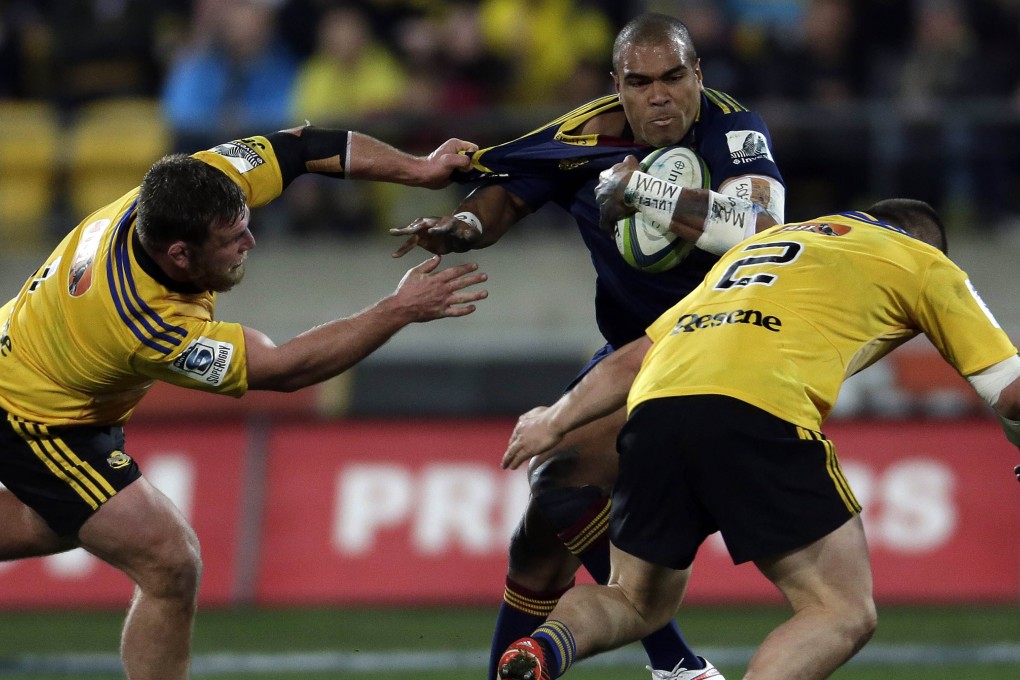 Patrick Osborne (centre) was a strong performer for the Highlanders during the Super Rugby season and has been rewarded by being added to the All Blacks squad. Photo: AFP