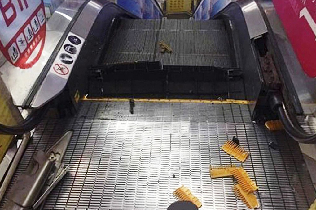 A cleaner mopping an escalator at a Shanghai mall had to have his foot amputated after it was caught in the machine on Saturday. Photo: SCMP Pictures