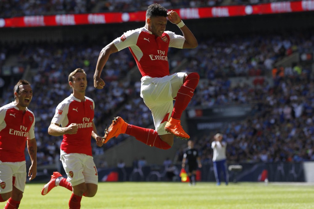 Arsenal midfielder Alex Oxlade-Chamberlain celebrates scoring the winner in a 1-0 victory over Chelsea in the FA Community Shield match at Wembley. Photo: AFP