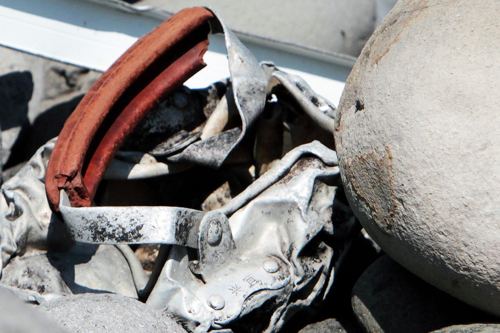 Metallic debris was found on a beach in Saint-Denis on Reunion Island in the Indian Ocean, close to where a wing part believed to belong to missing flight MH370 washed up last week. Photo: AFP