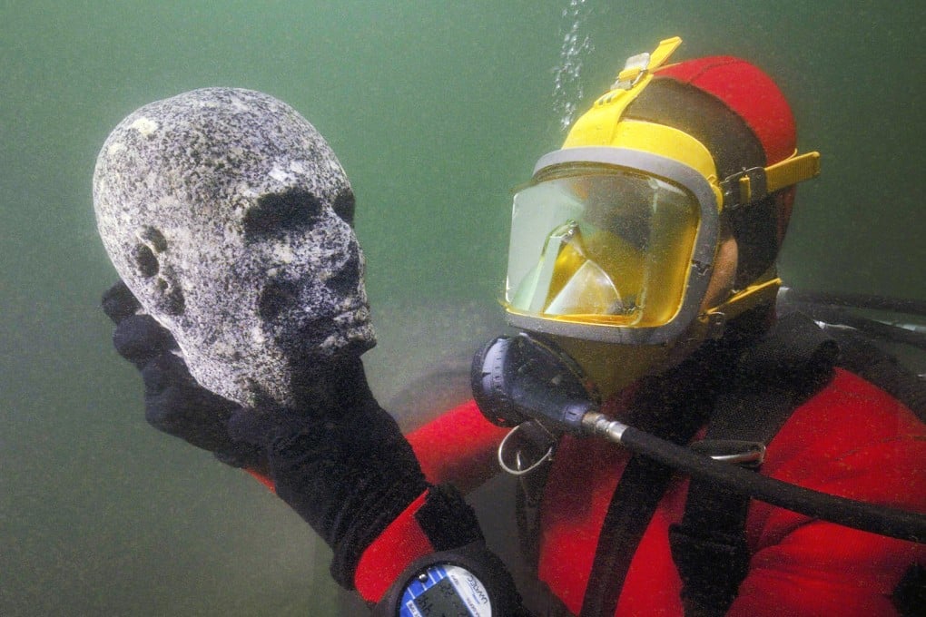 This granite head of a priest from the Ptolemaic period is among the submerged treasures. Photo: Christoph Gerigk