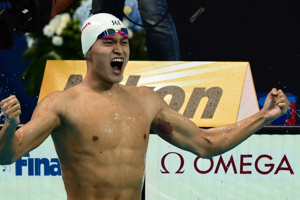 China's Sun Yang celebrates defending his 400m freestyle title at the world championships in Kazan. Photo: AFP