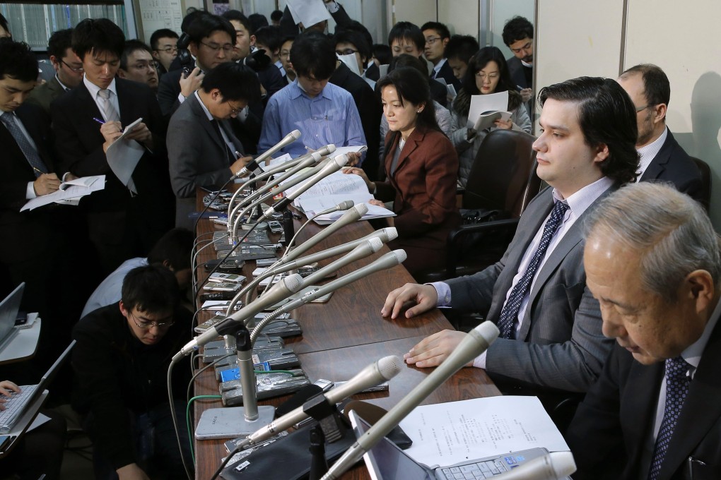 Mark Karpeles (second right), founder of the MtGox Bitcoin exchange, fronts a press conference in 2014 at Japan's justice ministry in Tokyo. Photo: Kyodo
