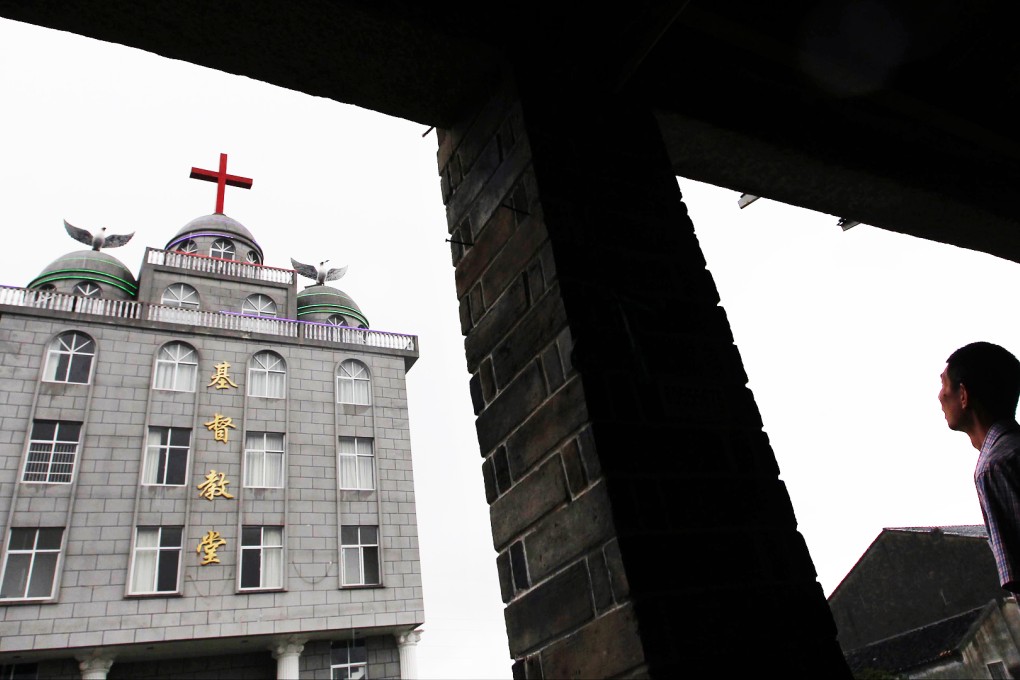The cross on top of Lingbo Church, in Wenzhou, in Zhejiang province, is just one of many that the local government has asked to be removed. Photo: Simon Song