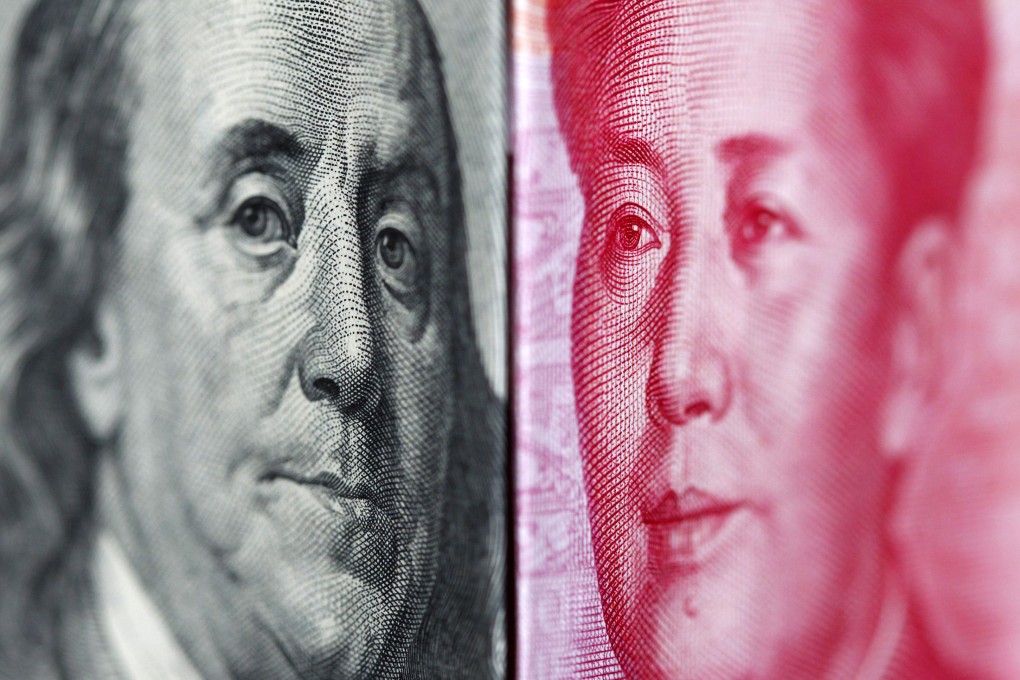 The Chinese yuan (right) hopes to join the US dollar as a reserve currency in the IMF at its review later in the year, but hopes may be fading for that to happen, one analyst says. Photo: Reuters