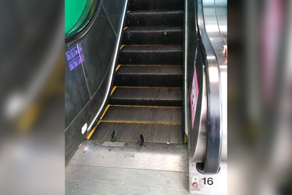 A picture on Facebook shows just two wheels stuck at the bottom of this escalator at Tai To Plaza in Tai Po. Photo: SCMP Pictures