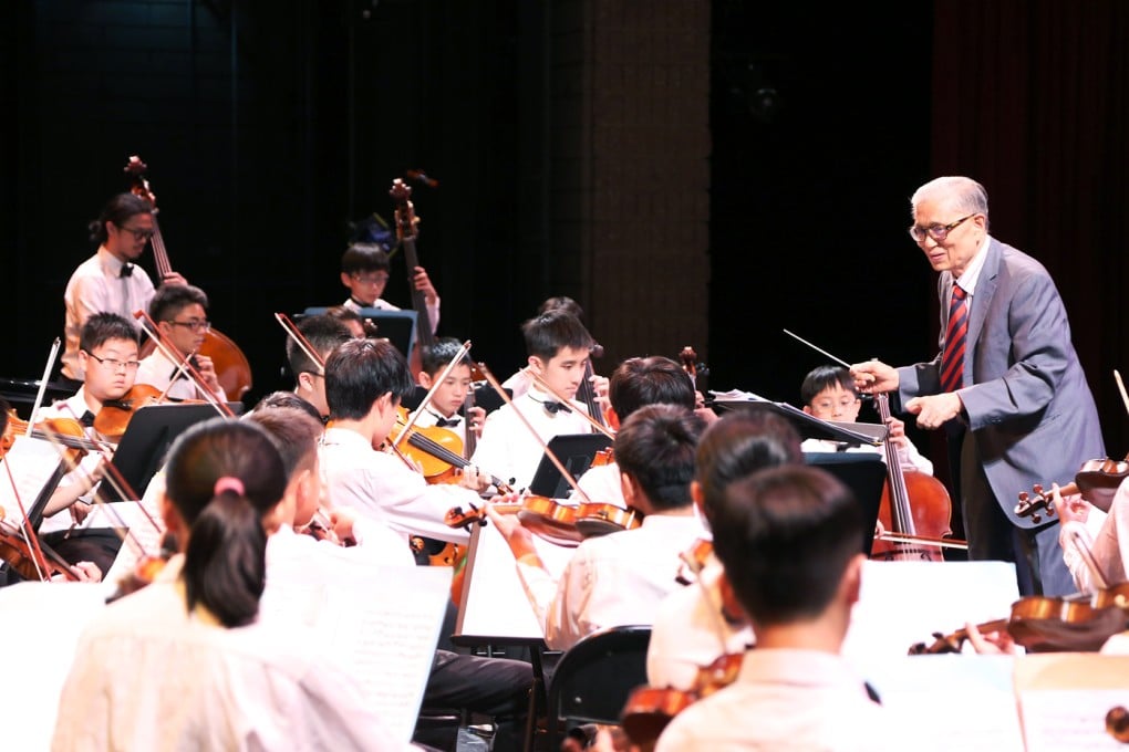 Veteran music educator and conductor Dr Yip Wai-hong leads the Hong Kong Children's Symphony Orchestra during a performance in Los Angeles last month. Photo: Yip Wai-hong