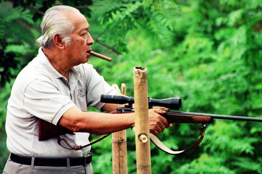 Then-Indonesian President Suharto shoots targets with a rifle at the family's Tapos ranch in West Java, in 1994. The Indonesia government wants to revive a Suharto-era law that bans insulting the country's president. Photo: AP