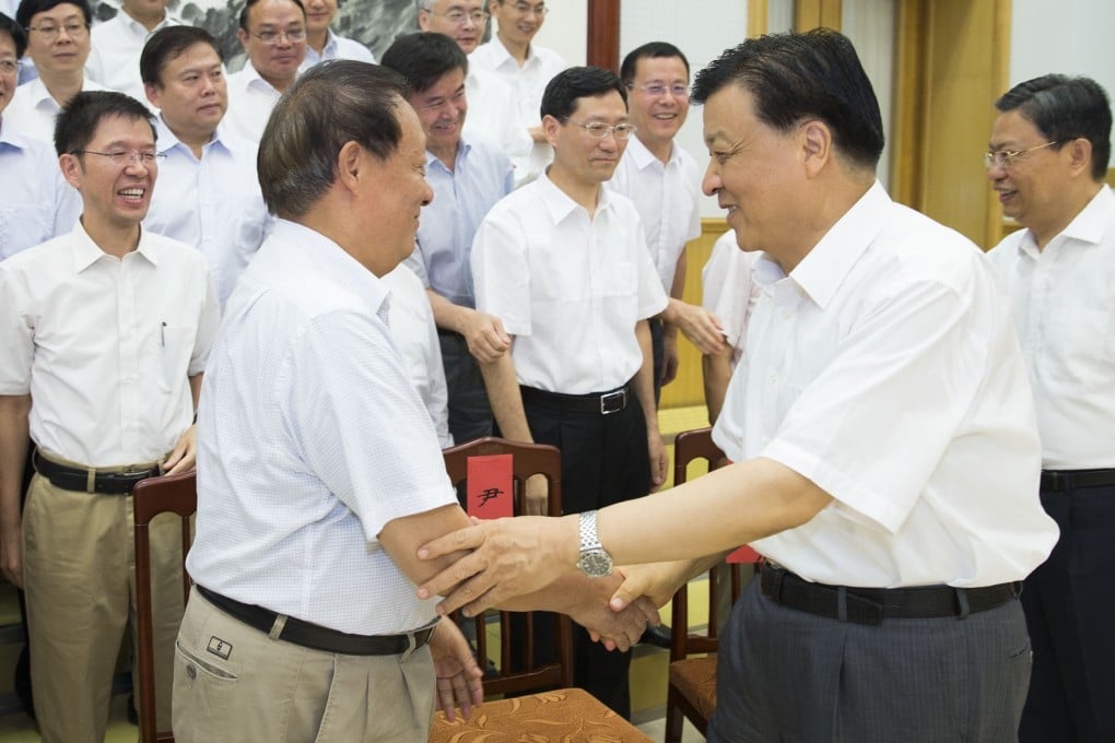 Liu Yunshan, China's Politburo Standing Committee member and Secretariat head, meets scientists and experts who are enjoying a state-sponsored summer vacation at popular seaside resort Beidaihe in Hebei province. Photo: Xinhua