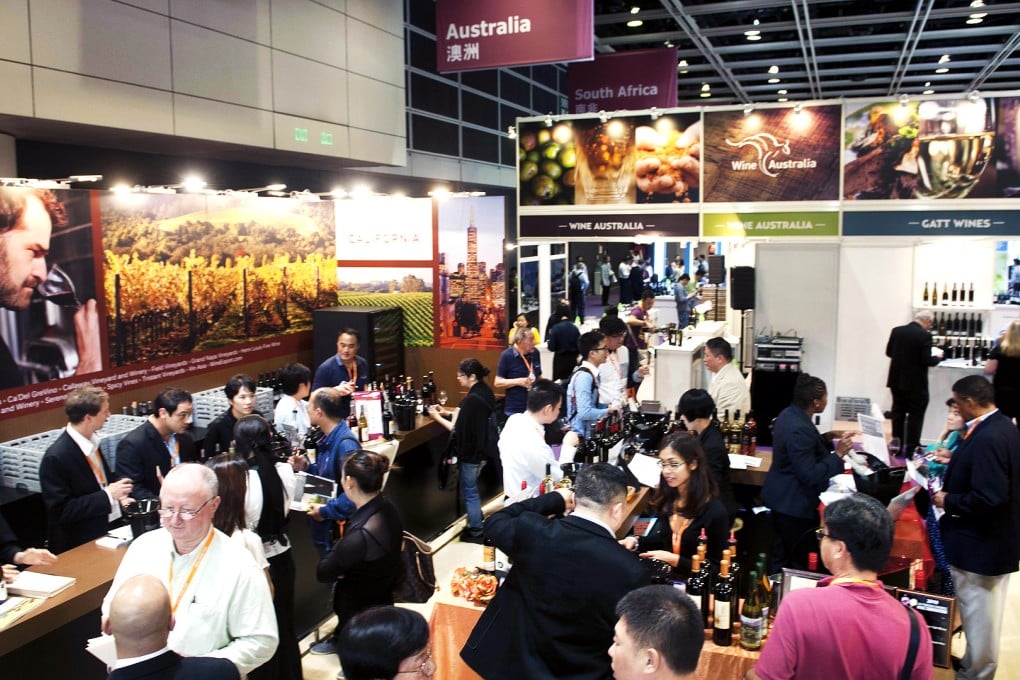 Business travellers at the Hong Kong Wine Fair 2014. Venues like the Convention and Exhibition Centre in Wan Chai are key to Hong Kong's MICE industry. Photo: SCMP