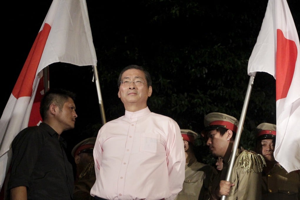 Pro-China activist Chang An-lo, a former triad boss also known as "White Wolf", takes part in a protest on Wednesday against students occupying the entrance to Taiwan's Ministry of Education in Taipei. Photo: Reuters