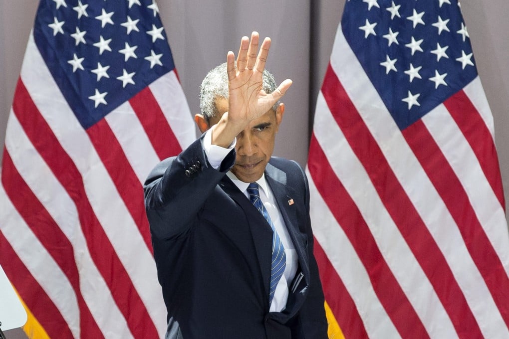 Barack Obama gestures during his appearance at American University on Wednesday. Photo: EPA