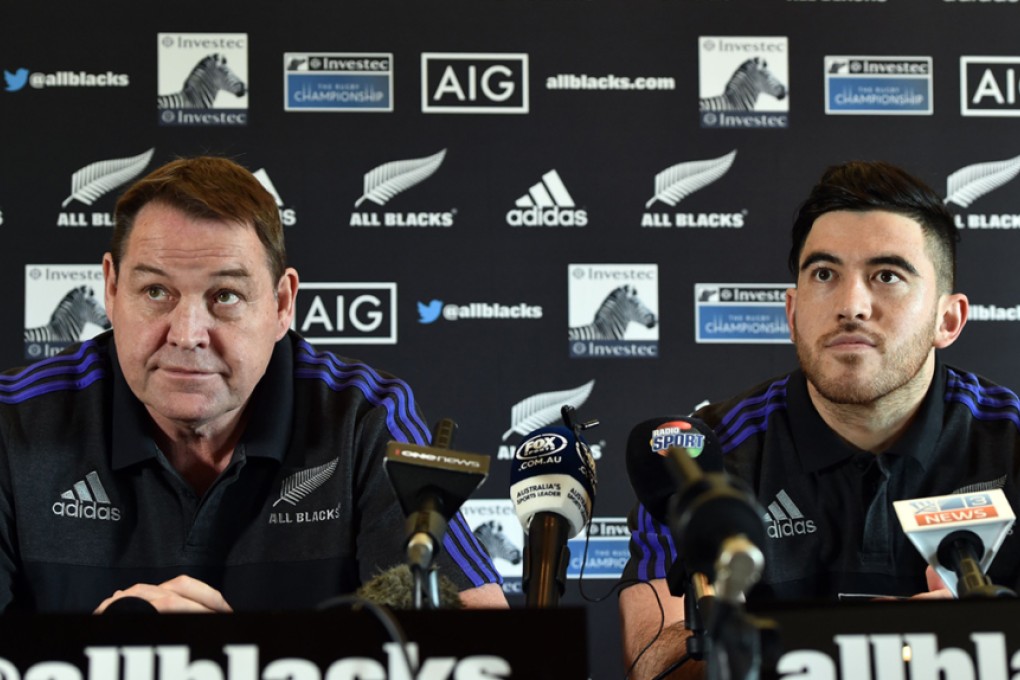Coach Steve Hansen (left) and wing Nehe Milner-Skudder attend a Sydney press conference on Thursday announcing the Hurricanes standout's inclusion in the All Blacks line-up for Saturday's Rugby Championship match against Australia. Photos: AFP