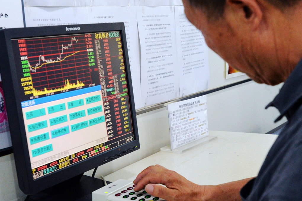 An investor in Beijing put in his order at a securities firm in China's volatile stock markets. Photo: Kyodo