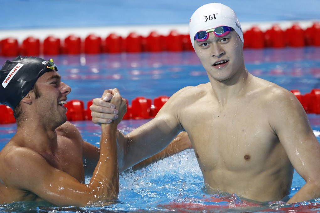 China's gold medal winner Sun Yang (right) is congratulated by Italy's Gregorio Paltrinieri after the men's 800m freestyle final at the Swimming World Championships in Kazan. Photo: AP