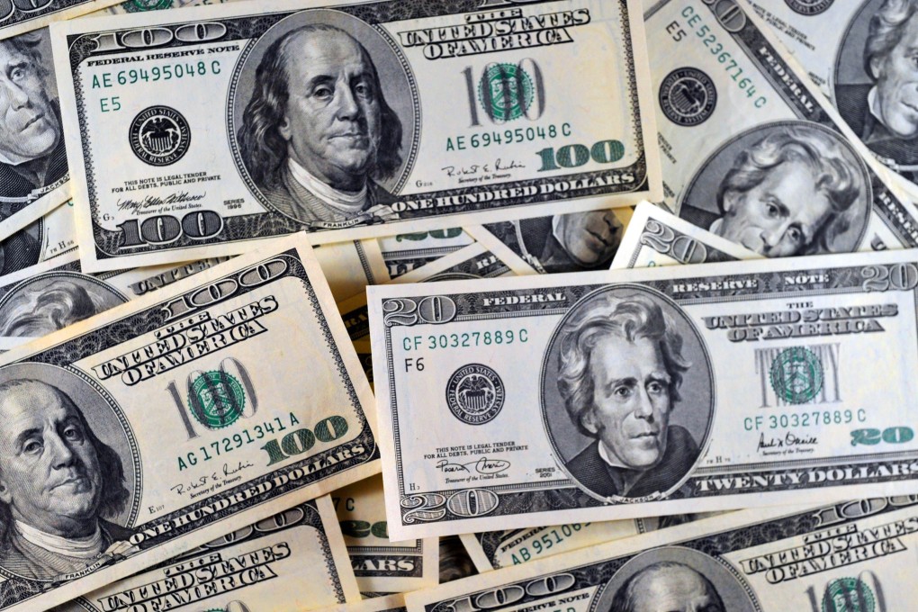 Stacks of US dollar bills are seen in Virginia as bullish bets on the greenback seem a sound strategy, given that US interest rates may be rising as soon as next month. Photo: AFP