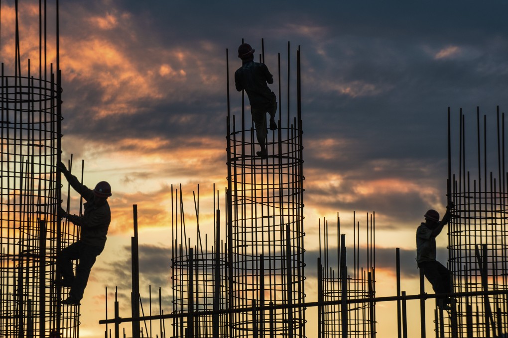 Workers at a construction site close to the Three Gorges Dam, in central China's Hubei Province. Photo: Xinhua