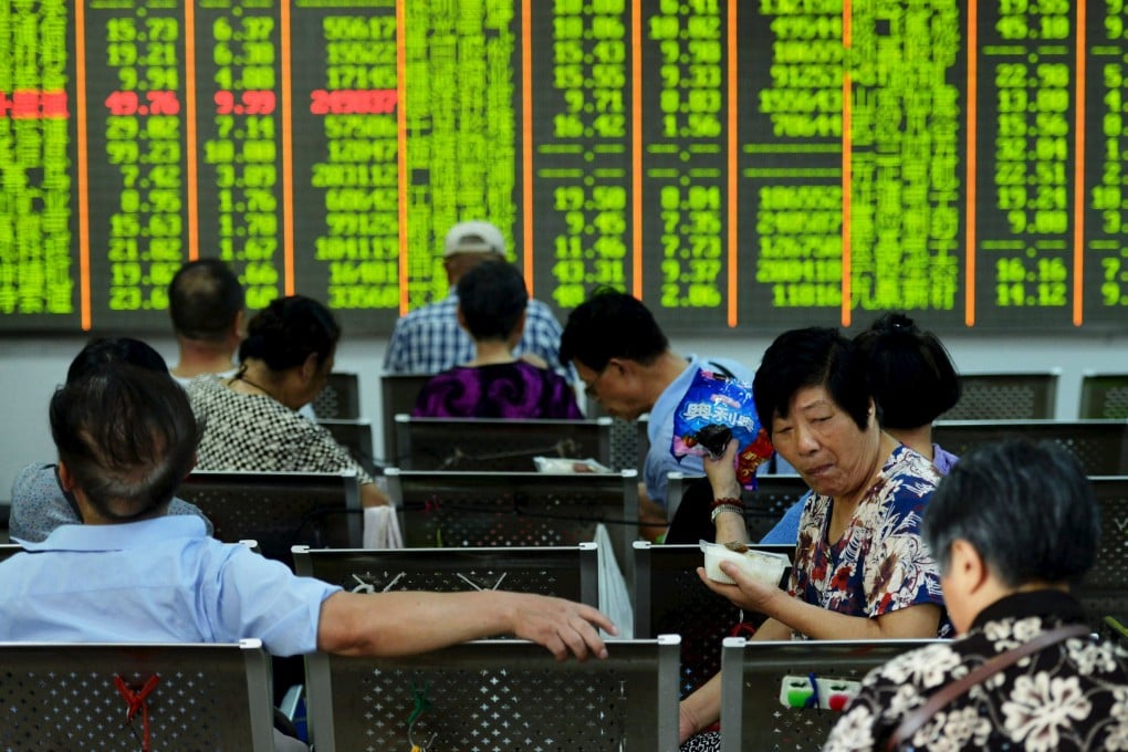 Retail investors in Hangzhou monitor stock prices last week. Access to share markets is limited for foreign companies, but firms are able to get round the curbs, according to insiders. Photo: Reuters