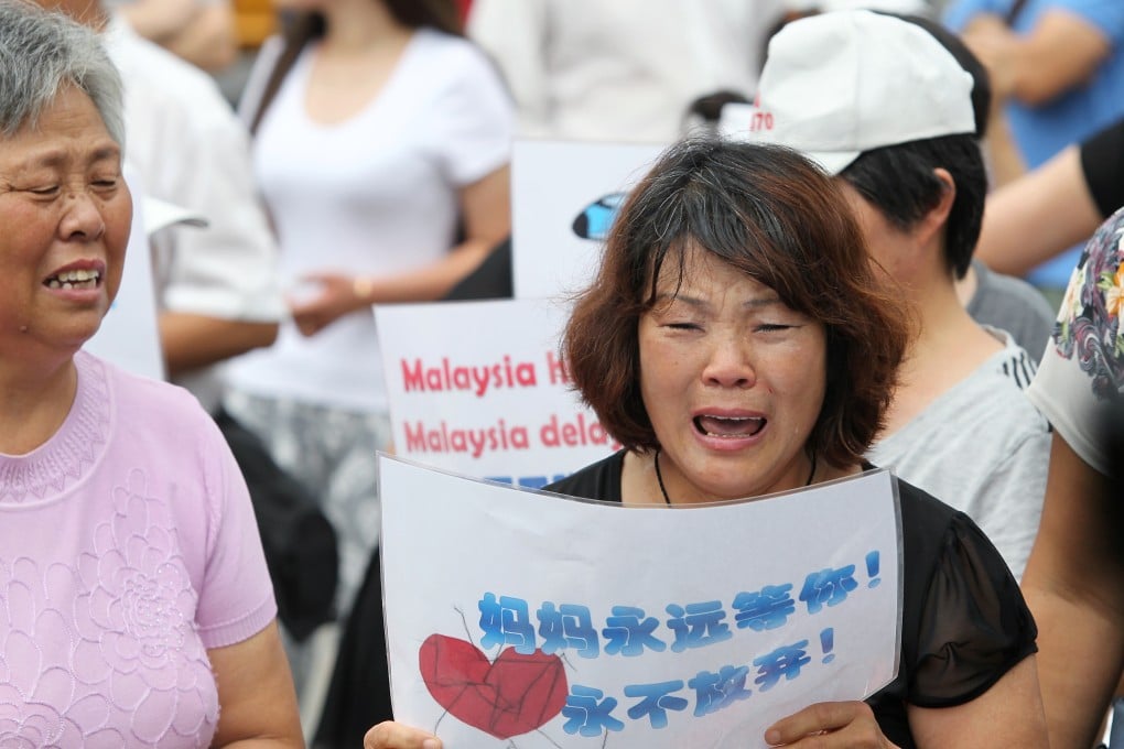 Relatives of Chinese passengers on missing flight MH370 protest near the Malaysian embassy in Beijing last week. Photo: Simon Song