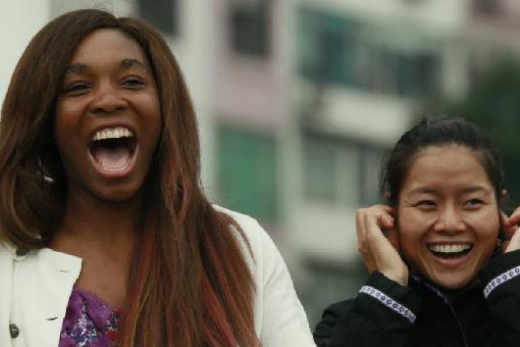 Venus Williams and China's Li Na have fun during the American's trip to Hong Kong in 2011. Photo: SCMP Pictures