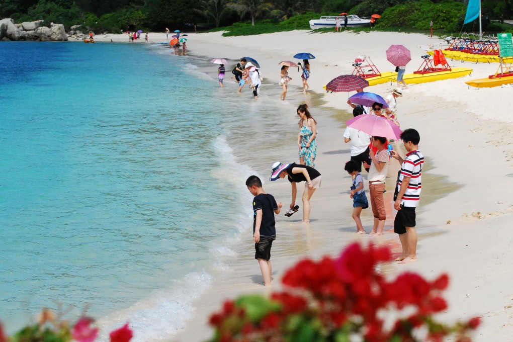 China's State Council wants workers to take Friday afternoons off in the summer so they can make long-weekend trips to popular tourist spots such as Wuzhizhou Island, off the coast of Hainan Province. Photo: Keith Chan