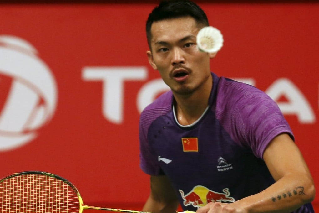 Lin Dan plays a shot against American Sattawat Pongnairat. Photo: Reuters
