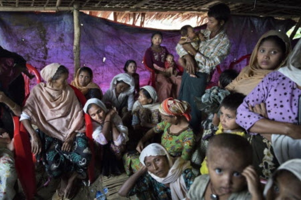 Rohingya women and children at a makeshift medical clinic in Myanmar. Official estimates have put the number of undocumented Rohingya in Bangladesh at between 200,000 and 500,000. Photo: The Washington Post