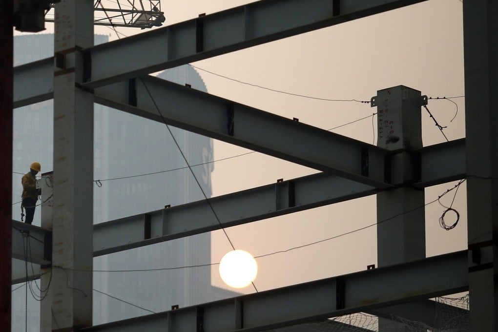 Investors are worried over risks arising from mainland developers' foreign debt exposure following the yuan's devaluation. Photo: Reuters