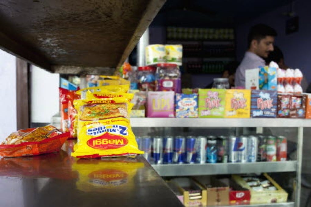 Packets of Maggi instant noodles are displayed at a tea stall in Dharmsala, India. Photo: AP
