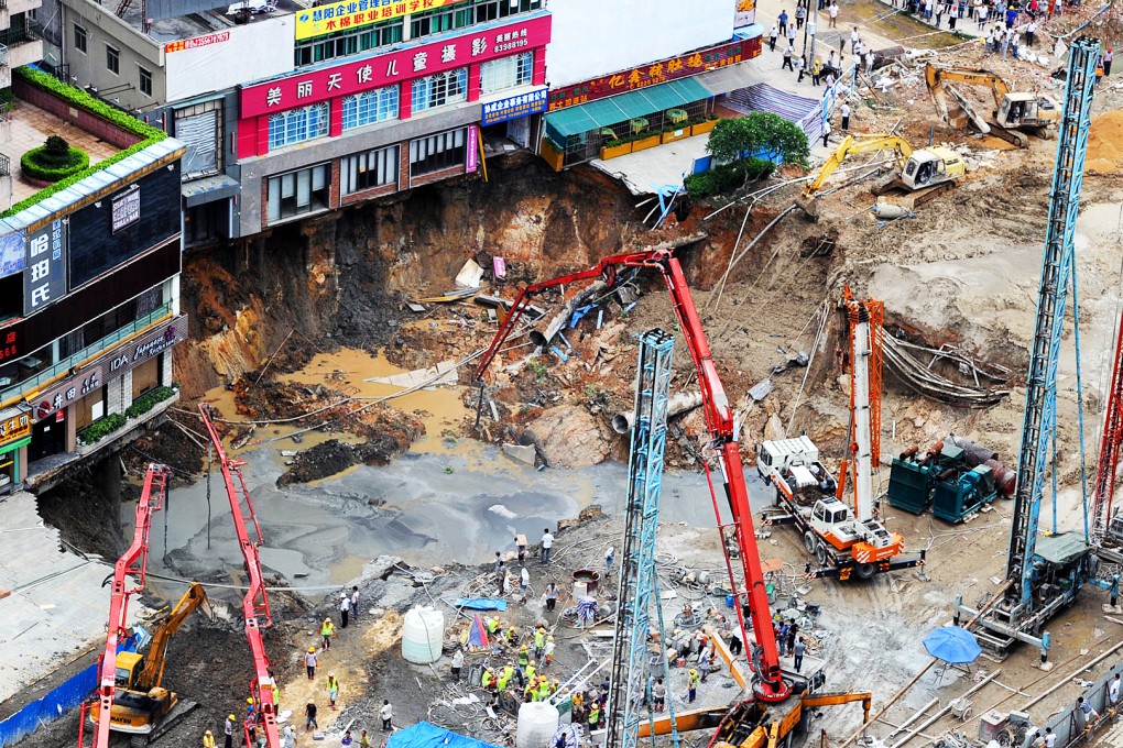 Workers repair at the scene of a collapsing accident at a construction site of Changping Road, part of the Dongguan-Huizhou railway, in Dongguan. Photo: Xinhua