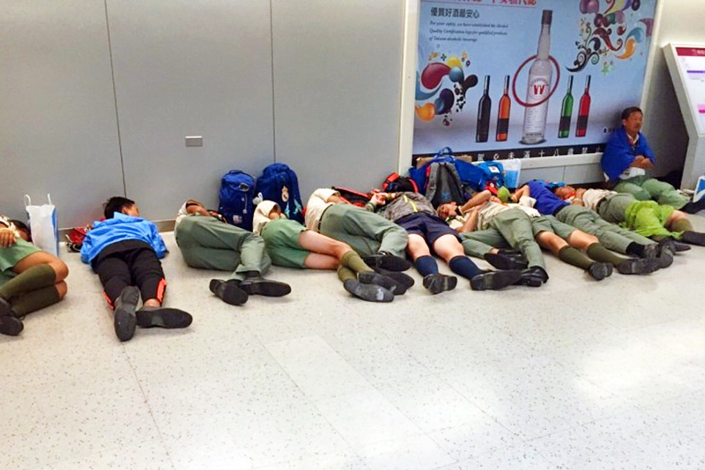 Hong Kong boy scouts rough it out in Taiwan's Taoyuan International Airport