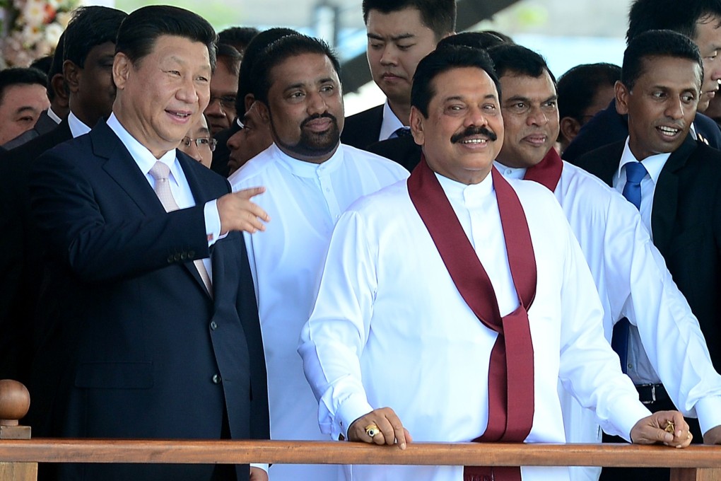President Xi Jinping speaks with then Sri Lankan president Mahinda Rajapaksa on a visit to Sri Lanka in September last year. Photo: AFP