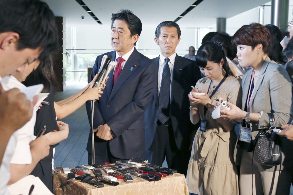 Japanese Prime Minister Shinzo Abe has previously scrapped the initial construction plan for the new national stadium. Photo: Kyodo