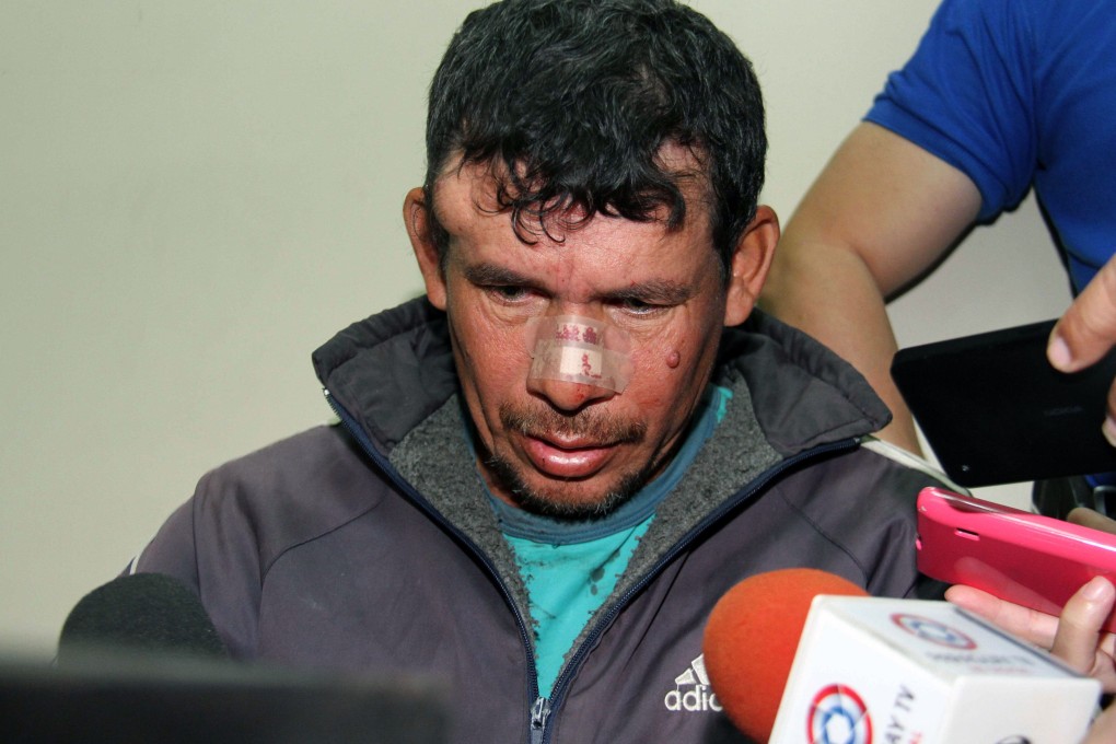 The girl's alleged rapist, who is her stepfather, is paraded before the press after his arrest in May. Photo: AFP